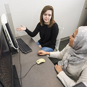 photo of students in the interactions, design, modeling lab