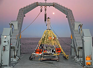 Pyramid-shaped multicorer on the deck of the R/V Melville