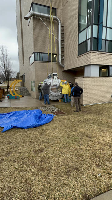 MRI lifted by crane 3