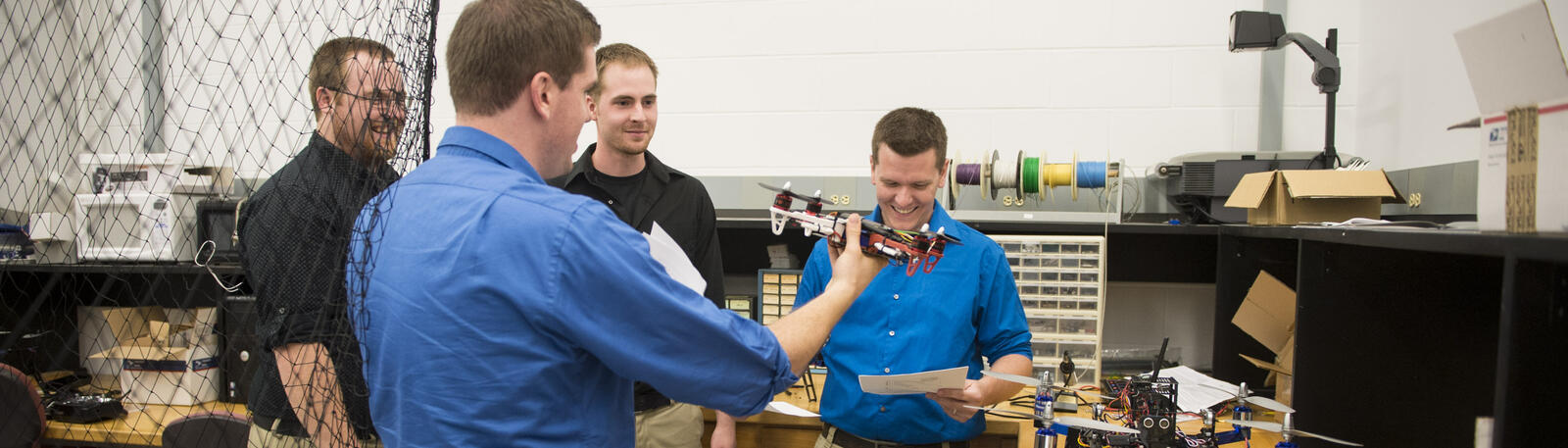 photo of engineering students working in a lab