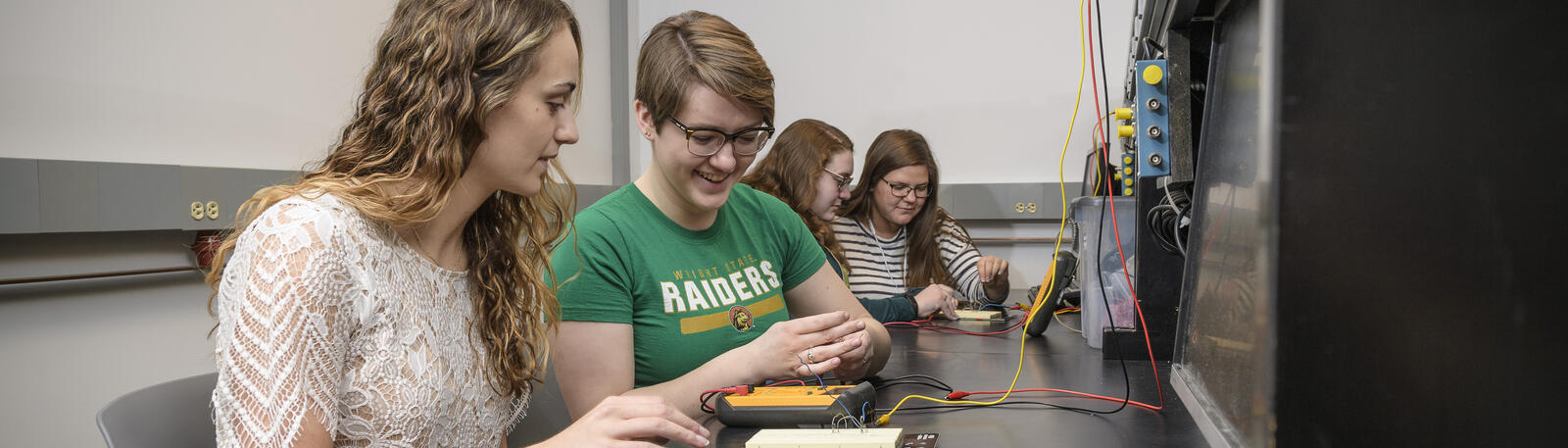 photo of students working on computers