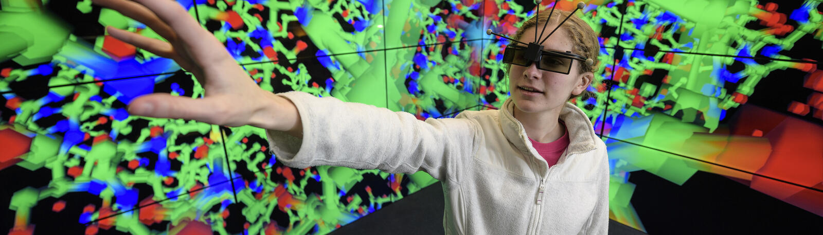 photo of a student in a the visualization lab