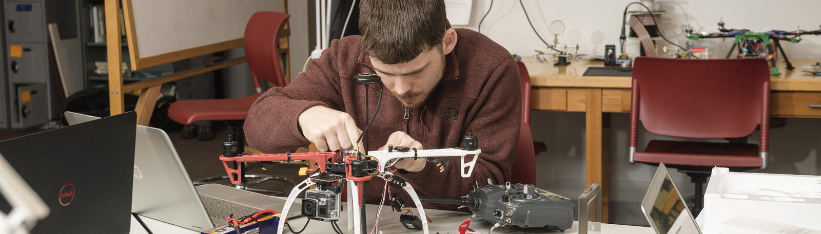 photo of an engineering student working on a project