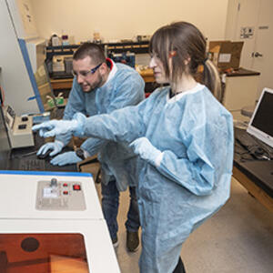 photo of students in the nanomedicine lab
