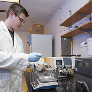 photo of a student in the tissue culture facility